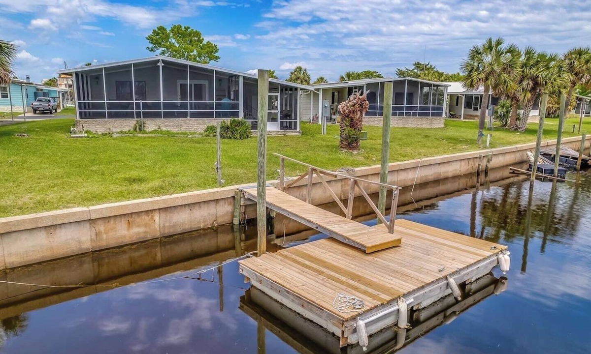 Crawfordville House | This popular 3 BR/2 BA home sits on a canal in the gated community of Paradise Village
