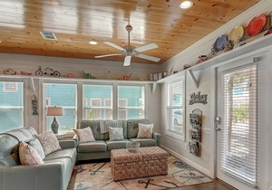 Come spend a little "Island Time" in this 3 bed 3 1/2 bath home!