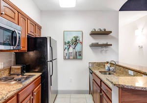 Dog-friendly, lakefront condo with WiFi, pool, hot tub, tennis, & beach access
