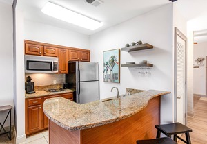 Dog-friendly, lakefront condo with WiFi, pool, hot tub, tennis, & beach access