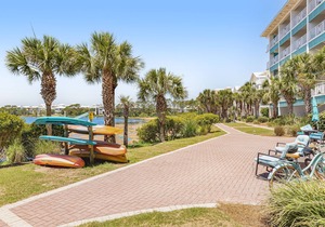 Dog-friendly, lakefront condo with WiFi, pool, hot tub, tennis, & beach access
