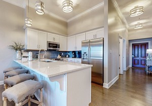 Elegant condo with 2 community pools, hot tub, & beach access across the road