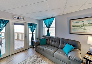 Updated island getaway with a pool, hot tub, & fishing pier - walk to beach & dining