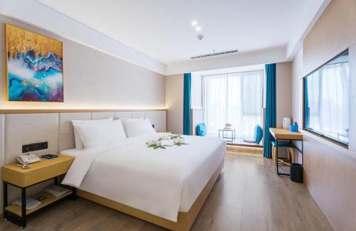 Shuimogou District Hotel | 乌鲁木齐会展中心万信至格酒店