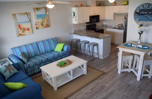 West Panama City Beach Condo | Beach across the street! Easy Parking!