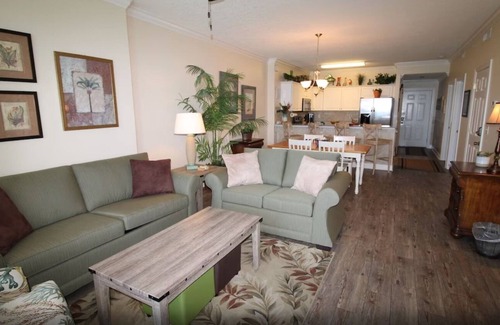 West Panama City Beach Condo | Emerald Isle 1406 - Front row beach chair service included! Affordable rates!