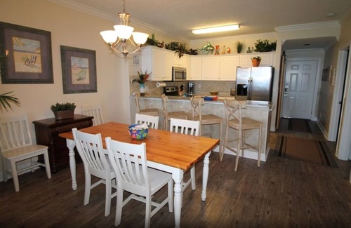West Panama City Beach Condo | Emerald Isle 1406 - Front row beach chair service included! Affordable rates!