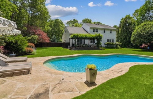 Westhampton House | NEW DECK! Private 1 Acre Family Friendly Home - Heated Pool, Home Office & Gym