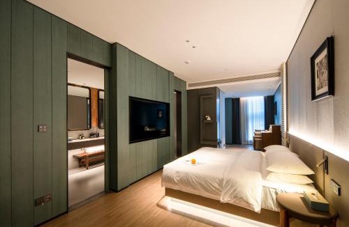 Zhengdong New Area Hotel | 华星谷奈酒店郑州高铁东站店