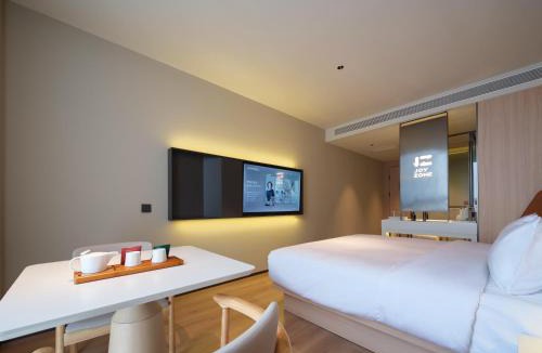 Hongqi District Hotel | 桔作酒店 新乡东站市政府店