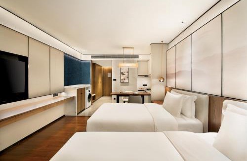 Jiangxia District Hotel | 武汉光谷豪生酒店