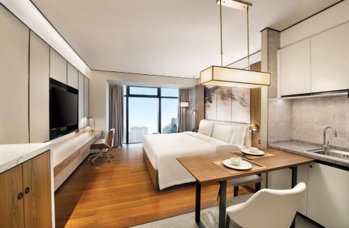 Jiangxia District Hotel | 武汉光谷豪生酒店