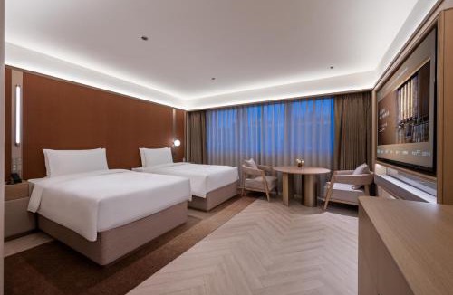 Jiang'an District Hotel | 武汉汉口金融中心万象城桔子水晶酒店