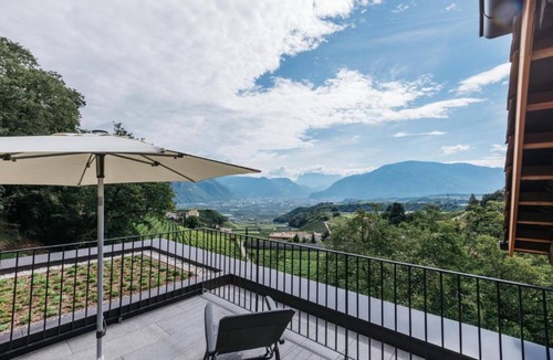 Appiano Sulla Strada del Vino Apartment | Apartment 'Firmelein - Dachwohnung' with Mountain View, Private Terrace and Wi-Fi