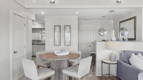 Seacrest House | Beach Retreat w Sundeck Golf Cart Bikes Bungalow House by AvantStay