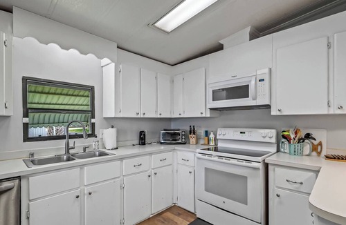 Crawfordville House | This popular 3 BR/2 BA home sits on a canal in the gated community of Paradise Village