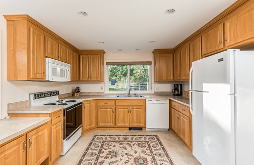 South Chatham House | Waterfront home with lovely lake views, great deck, sun porch & fireplace