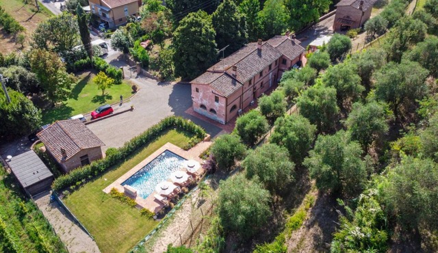 GuestHost - Enchanting villa located within an agricultural estate on the Tuscan hills, surrounded by nature and with a breathtaking view of the surrounding countryside. The property, equipped with private outdoor parking, outdoor swimming pool, gym area