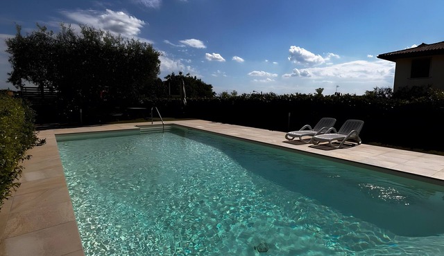 Holiday Home 'Appartamenti Villa Fiorito' with Lake View, Wi-Fi and Air Conditioning