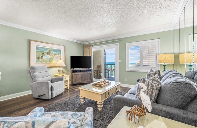 Coastal Cool Beachfront Condo with stunning ocean views! (313)