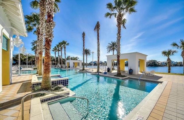 Dog-friendly, lakefront condo with WiFi, pool, hot tub, tennis, & beach access