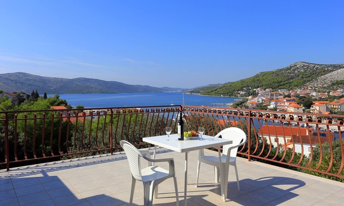 Seget Vranjica Apartment | Two bedroom apartment with terrace and sea view Seget Vranjica, Trogir (A-12760-c)