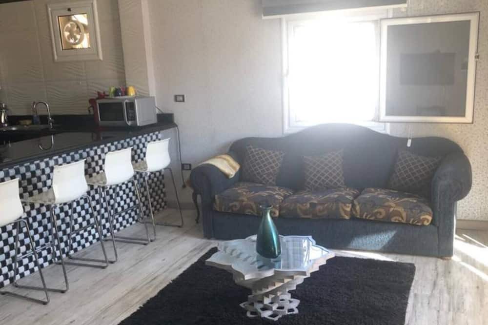 Photo of Livingroom in The 5th Settlement