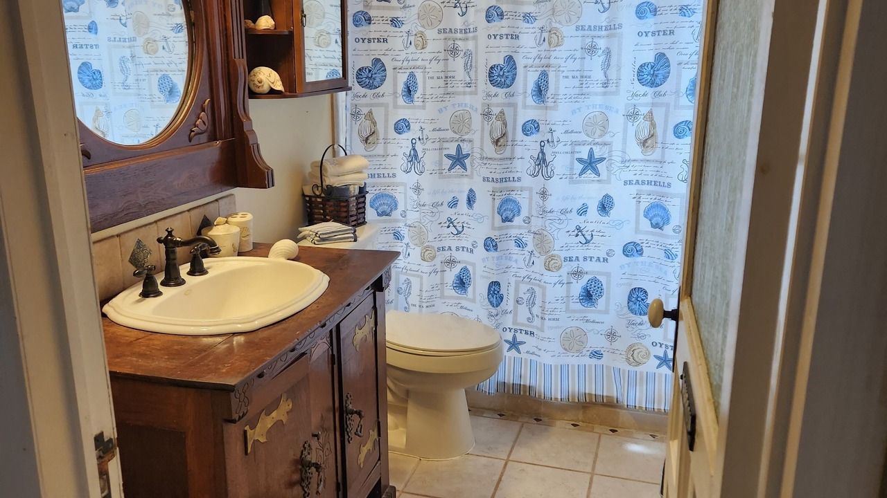 Photo of Bathroom in Le Barons Of Titusville