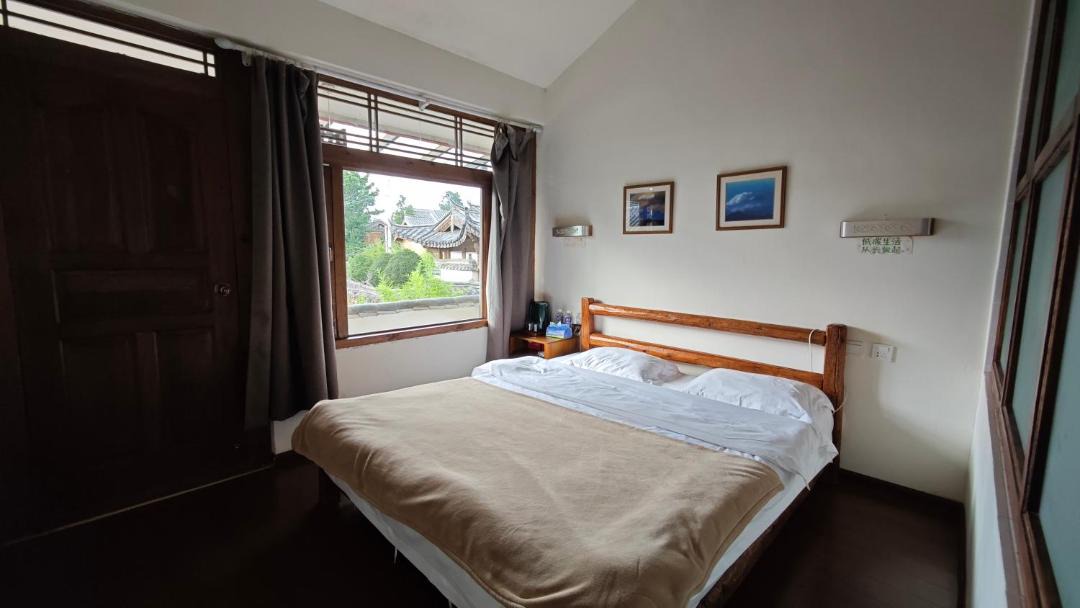 Photo of Bedroom in Baisha Old Town