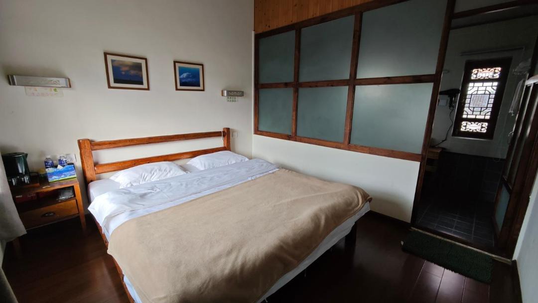 Photo of Bedroom in Baisha Old Town