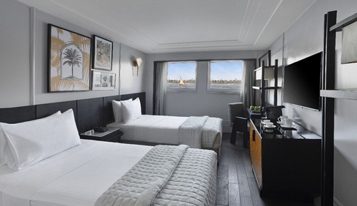 Standard Non Smoking Room with 1 double bed and 1 single bed, River side