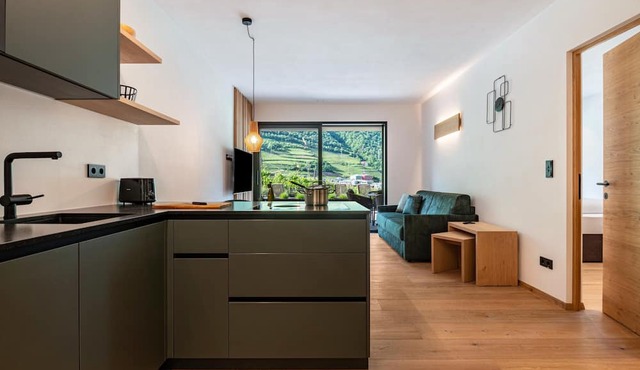 Apartment "Erbacher - Anna's Garten Suite" with Mountain View, Shared Pool & steam bath